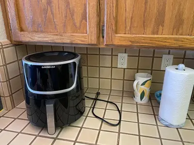a coffee maker sitting on a counter in a kitchen at Discovery Bay Home on fast water - 2,400Sq ft in Discovery Bay