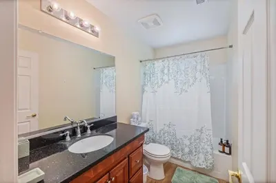 a bathroom with a sink and a toilet at Green Meadows at Sky Ranch, 13 miles from Yosemite in Oakhurst