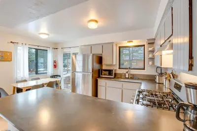 a kitchen with a large counter top in a room at Backyard Forest Retreat in South Lake Tahoe