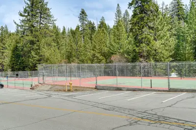 a tennis court with two tennis courts at Hike, Sled and Ski! Cozy Tahoe City Condo with Hot Tub in Tahoe City