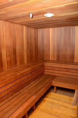 a empty sauna with wooden benches in a room at Aspen Creek #113 Family Friendly Condo in Mammoth Lakes