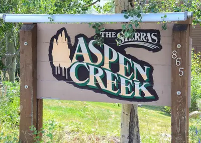 a sign for the asian green creeks at Aspen Creek #401 Year-Round Outdoor Activities in Mammoth Lakes