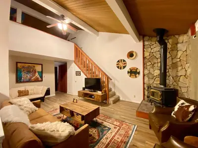 a living room with a couch and a fireplace at Sierra Manors #098 Nearby Hike & Bike Trails in Mammoth Lakes