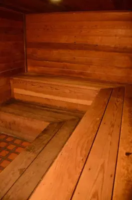a wooden floor in a sauna with wooden steps at Snowcreek #059 Near Shuttle & Activities in Mammoth Lakes