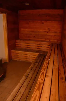 a wooden sauna with a wooden bench in a room at Snowcreek #630 Near Lakes & Golf in Mammoth Lakes