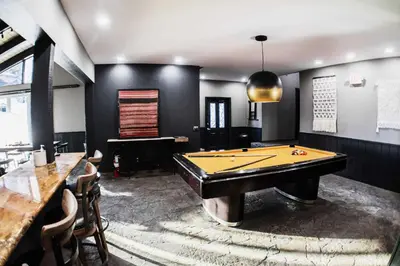 a billiard room with a pool table and a bar at Chamonix #70 Near Yearly Outdoor Activities in Mammoth Lakes