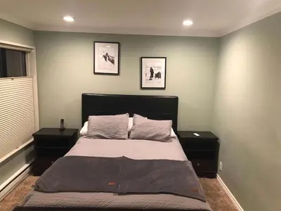 a bedroom with a large bed with two night stands at Fireside at The Village Near Hike Bike in Mammoth Lakes