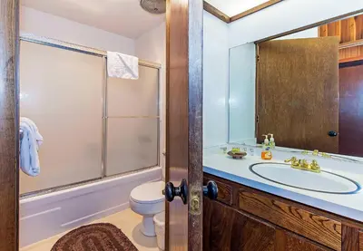 a bathroom with a sink and a shower and a toilet at Viewpoint #131 Walk to Eats & Entertainment in Mammoth Lakes