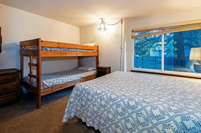 a bedroom with a bunk bed and a window at Horizons 4 - Year-Round Outdoor Activities in Mammoth Lakes
