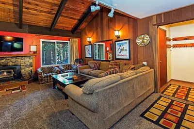 a living room with a couch and a fireplace at Horizons 4 - Year-Round Outdoor Activities in Mammoth Lakes