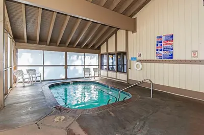a pool in the middle of a building at Horizons 4 - Year-Round Outdoor Activities in Mammoth Lakes