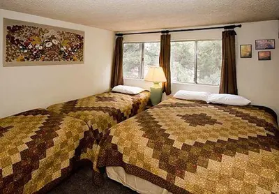 a bedroom with two beds and a window at La Residence - Near Shuttle and Hike & Bike Trails in Mammoth Lakes