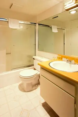 a bathroom with a toilet and a sink at La Vista Blanc #22 - Near Shuttle BBQ & Pool in Mammoth Lakes