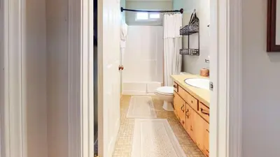 a bathroom with a toilet and a sink at Mammoth View Villas - Near Hike & Bike Trails in Mammoth Lakes
