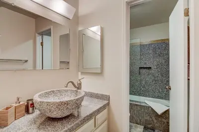 a bathroom with a sink and a shower at Alpine Meadows Peak 15 Min to Commons Beach in Alpine Meadows
