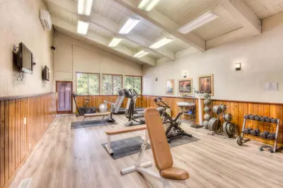 a gym with several exercise equipment in a room at Granlibakken Retreat Near Tahoe Beach in Tahoe City