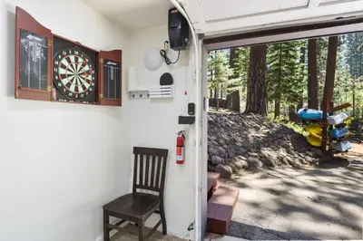 a dart board on the wall of a camper at Incline Bliss Dreamy Pet Friendly Escape in Incline Village