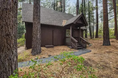 a small cabin in the woods with trees at Incline Cottage Year-Round Outdoor Fun in Incline Village
