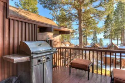 a grill on the deck of a house at Crystal Shores Villa Lake Views & Hiking in Incline Village