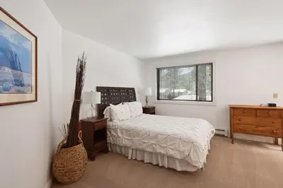 a white bedroom with a bed and a window at Incline Village Manor Near Beach & More in Incline Village