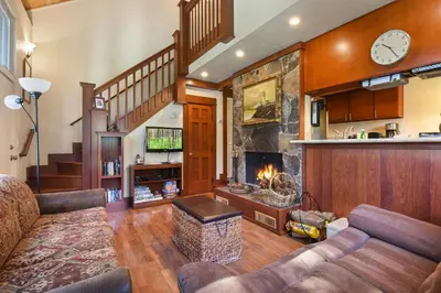 a living room with a couch and a fireplace at Tahoe City Getaway Minutes from Lake and Activities in Tahoe City
