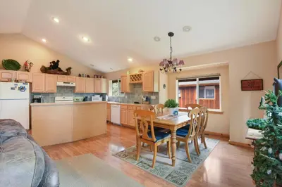 a kitchen and dining room with a table and chairs at Kings Beach Bliss Walk to Outdoor Fun in Kings Beach