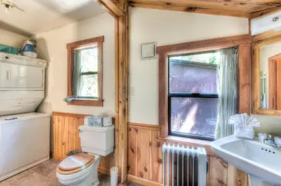 a bathroom with a toilet and a sink at Moonlight Cove w Grill Tahoe Beach Next Door in Tahoe Vista
