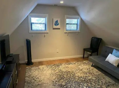 a living room with a couch and a tv at Moose Manor w BBQ Near Tahoe Hiking in Tahoma