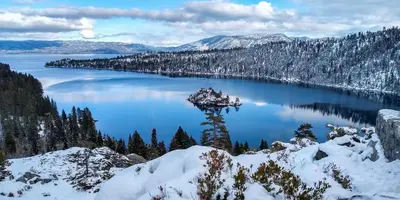 a view of a lake with snow on the ground at Heavenly Hollow in South Lake Tahoe