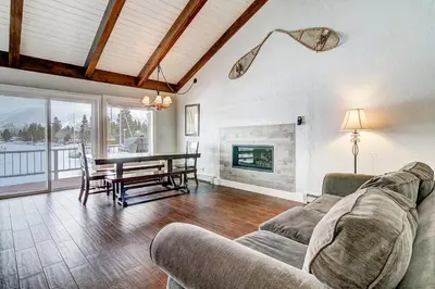 a living room with a couch and a table at Lucerne Lake House - Ski Lease 30plus Days in South Lake Tahoe