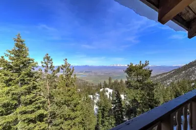 a view from the balcony of a house with trees at Mile High Mountain - Carson Valley Views in Stateline