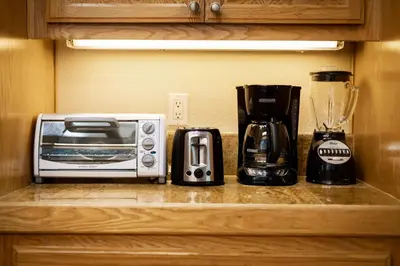 a kitchen counter with a toaster oven and a blender at Montgomery Estates Bliss - Hot tub pets family fun in South Lake Tahoe