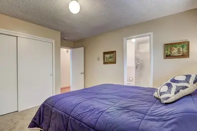 a bedroom with a purple bed with a pillow at Blue Black Bart - Foosball Near Town & More in South Lake Tahoe