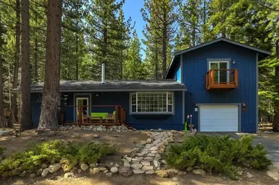 a blue tiny house in the woods at The Blue Lake House - Family fun Abound in South Lake Tahoe