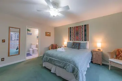 a bedroom with a bed and a ceiling fan at Elk Forest Escape - Economy Family Abode in South Lake Tahoe