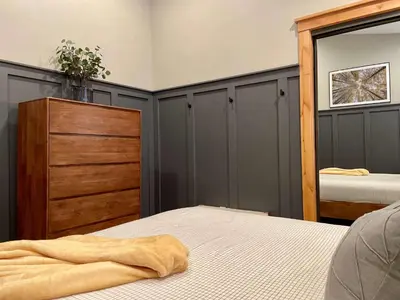 a bedroom with two beds and a dresser at It's a Sierra State of Mind - Family Fun in South Lake Tahoe