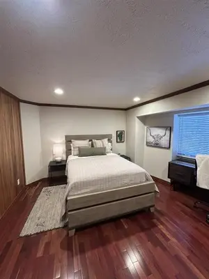 a bedroom with a large bed and a window at Sunset Cove Chic Tahoe Retreat in Glenbrook