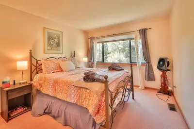 a bedroom with a bed and a window at Tahoe Family Getaway in Stateline