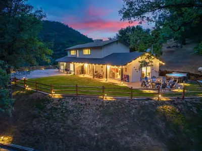 an aerial view of a home at night at Rivertop Hideaway in Ahwahnee
