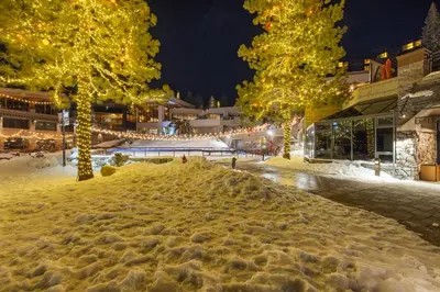 a pile of snow on a street at night at Everline Resort & Spa Palisades-Valley View Suite in Olympic Valley