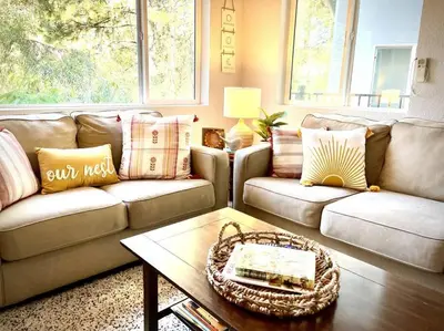 a living room with two couches and a coffee table at Gorgeous views 1st Apple hill exit Family Fun in Placerville