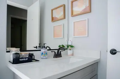 a bathroom counter with a sink and a mirror at Gorgeous views 1st Apple hill exit Family Fun in Placerville
