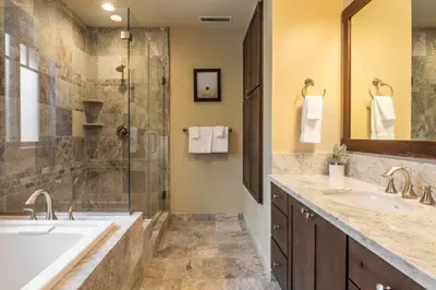 a bathroom with two sinks and a shower at Mountainside 14 in Mammoth Lakes