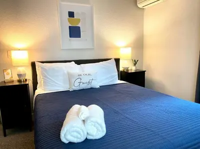 two towels are sitting on a bed with a pillow at Family Friendly 1st Apple Hill exit Tahoe in Placerville