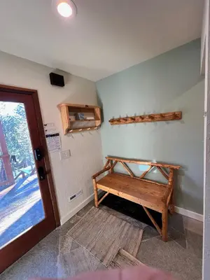 a room with a wooden bench on the wall at Serene Vistas at Northstar in Truckee
