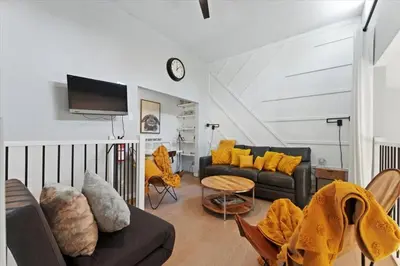 a living room with two couches and a tv at #LazyBear Tahoe Dreamy Escape in Tahoe Vista