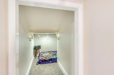 a small room with a bed in a hallway at Hot Tub, Games and Sports Luxury Yosemite Escape in Oakhurst