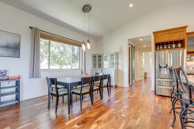 a kitchen and dining room with a table and chairs at On-Site Vineyard Gem on 10 Acres in Pilot Hill! in Pilot Hill