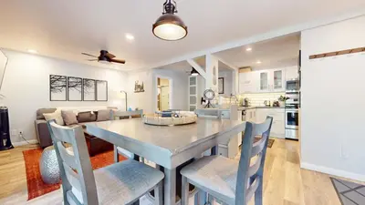 a kitchen and dining room with a table and chairs at Hidden Valley #41 condo in Mammoth Lakes