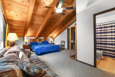 a living room with a couch and a bed at Valley View - Carson Valley Views in Stateline